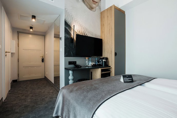 Imagen de la habitación del Hotel M4 Boutique. Foto 14