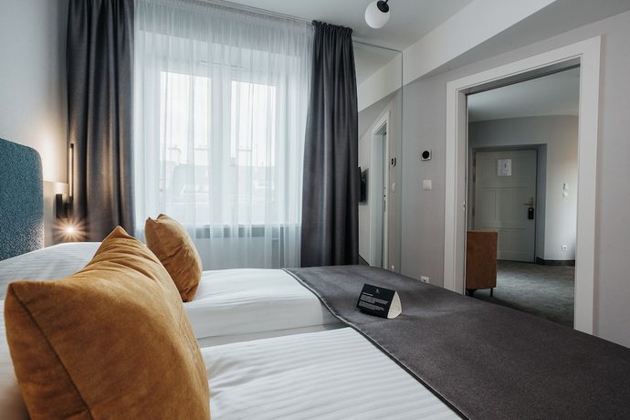 Imagen de la habitación del Hotel M4 Boutique. Foto 15