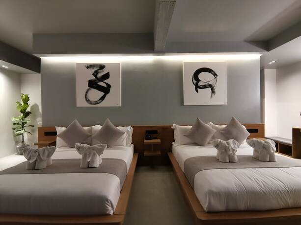 Imagen de la habitación del Hotel M5. Foto 18
