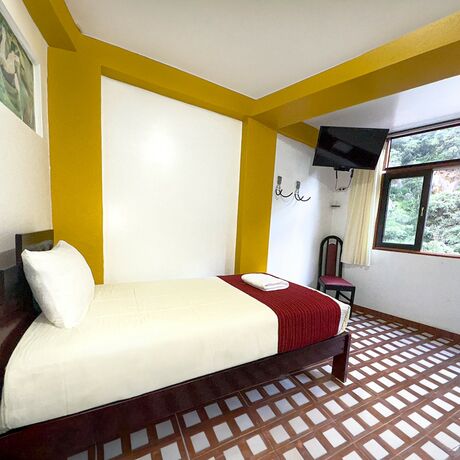 Imagen de la habitación del Hotel MACHUPICCHU BOUTIQUE. Foto 12