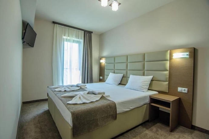 Imagen de la habitación del Hotel MAGNIFIC. Foto 5