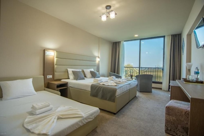 Imagen de la habitación del Hotel MAGNIFIC. Foto 7