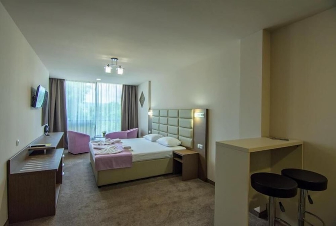 Imagen de la habitación del Hotel MAGNIFIC. Foto 9