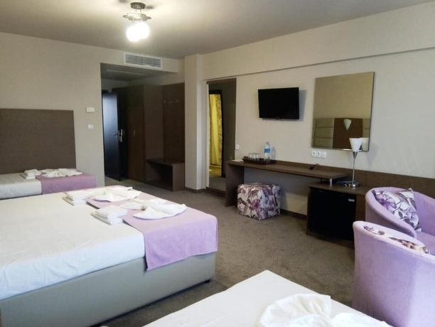 Imagen de la habitación del Hotel MAGNIFIC. Foto 11