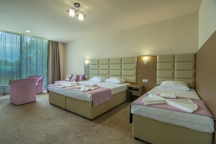 Imagen de la habitación del Hotel MAGNIFIC. Foto 12