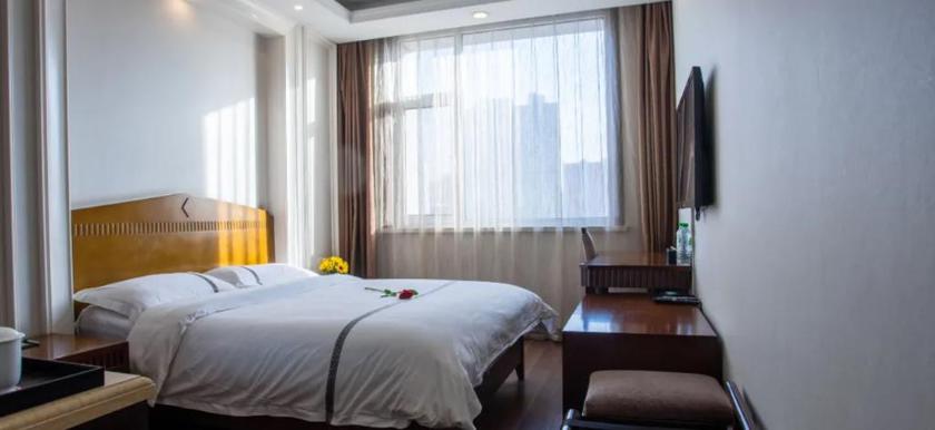 Imagen de la habitación del Hotel MAIJISHAN HOTEL. Foto 3