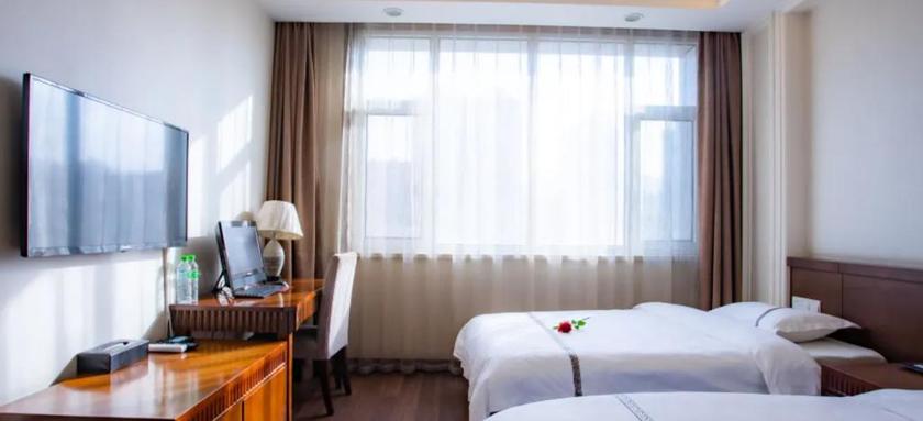 Imagen de la habitación del Hotel MAIJISHAN HOTEL. Foto 5