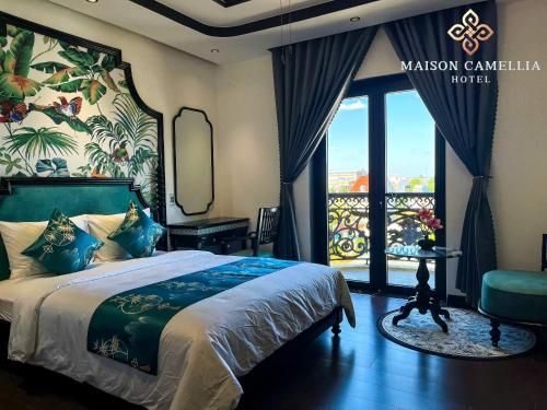 Imagen de la habitación del Hotel MAISON CAMELLIA. Foto 20