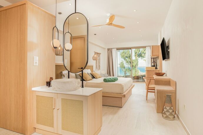 Imagen de la habitación del Hotel MAKO Sea and Suites. Foto 11