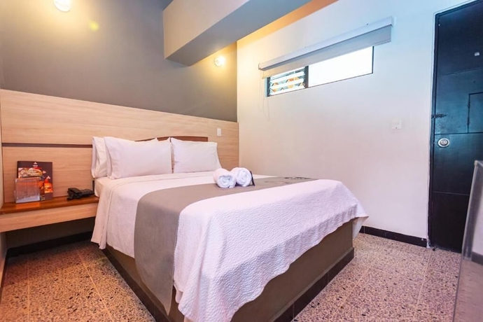 Imagen de la habitación del Hotel MANDALA HOTEL BOTERO. Foto 9