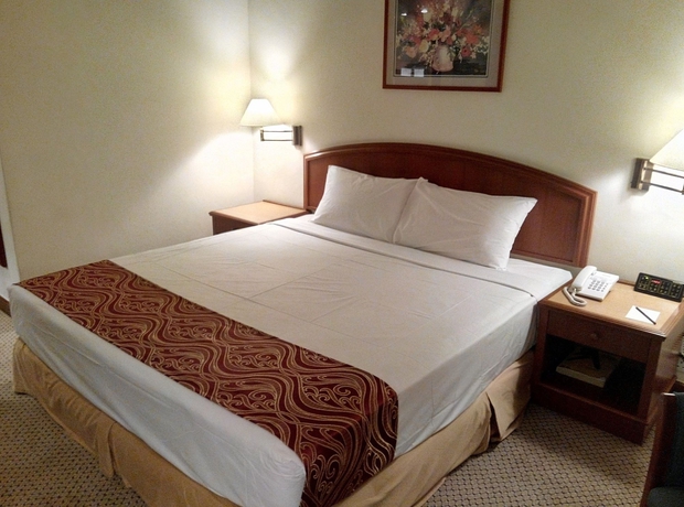 Imagen de la habitación del Hotel MANDARIN COURT. Foto 1