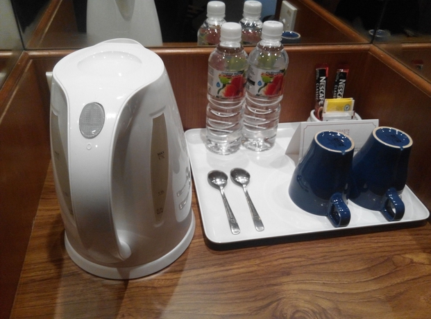 Imagen de la habitación del Hotel MANDARIN COURT. Foto 2