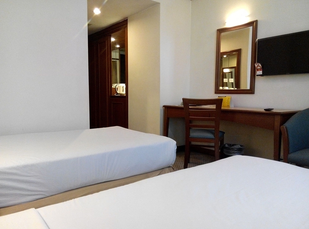 Imagen de la habitación del Hotel MANDARIN COURT. Foto 7