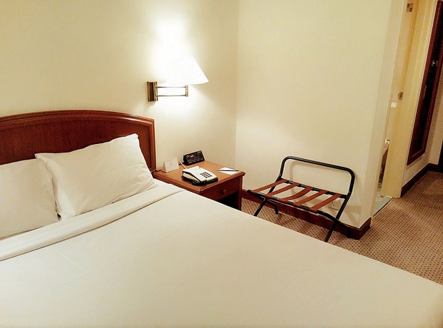 Imagen de la habitación del Hotel MANDARIN COURT. Foto 11