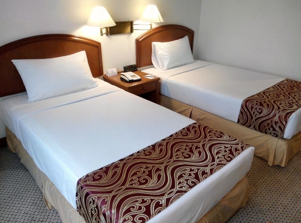 Imagen de la habitación del Hotel MANDARIN COURT. Foto 13