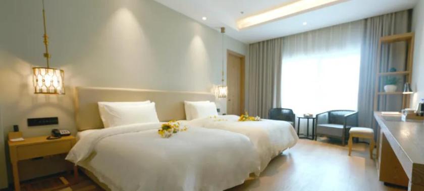 Imagen de la habitación del Hotel MANJU HOTEL (JIANGNAN YIBU). Foto 9