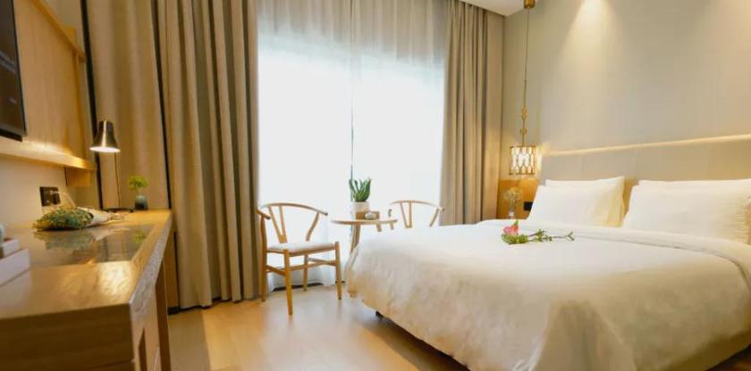 Imagen de la habitación del Hotel MANJU HOTEL (JIANGNAN YIBU). Foto 11