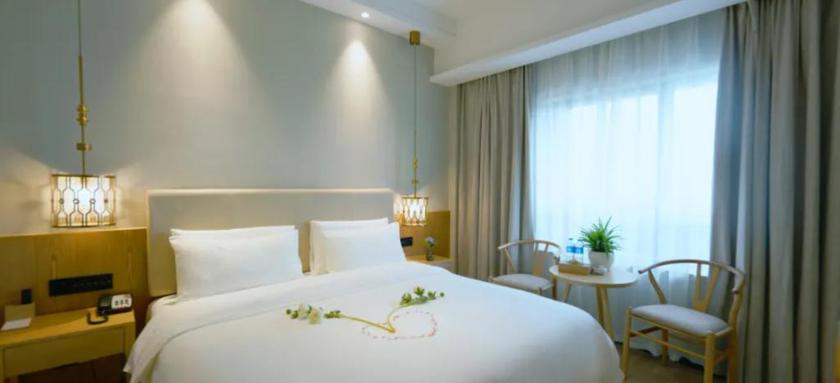 Imagen de la habitación del Hotel MANJU HOTEL (JIANGNAN YIBU). Foto 13
