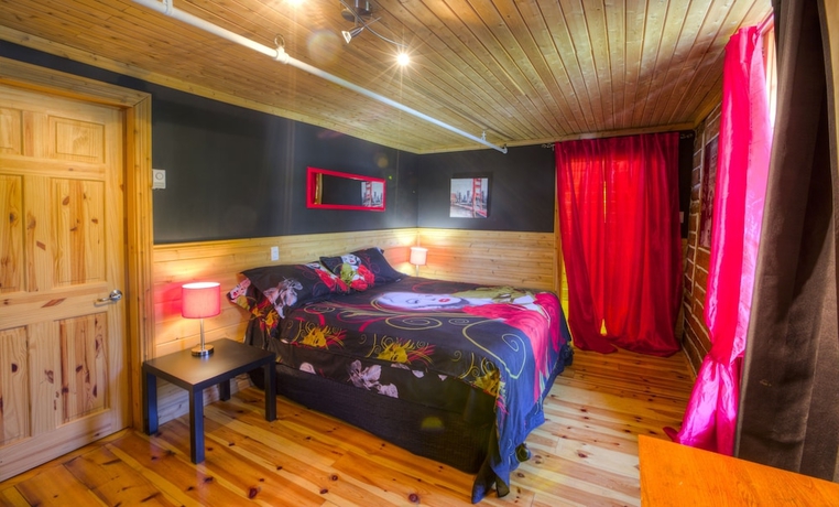 Imagen de la habitación del Hotel MANOIR CHARLEVOIX. Foto 2