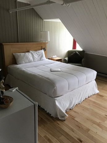 Imagen de la habitación del Hotel MANOIR CHARLEVOIX. Foto 5