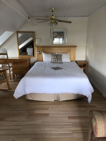 Imagen de la habitación del Hotel MANOIR CHARLEVOIX. Foto 6