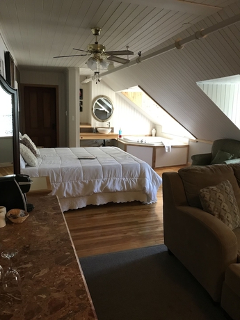 Imagen de la habitación del Hotel MANOIR CHARLEVOIX. Foto 11