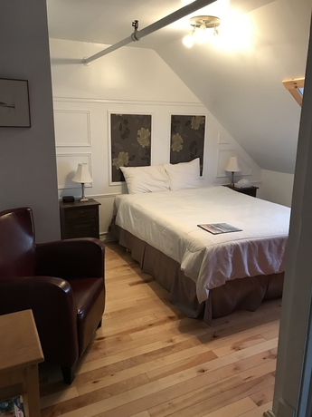 Imagen de la habitación del Hotel MANOIR CHARLEVOIX. Foto 15
