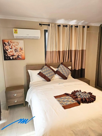 Imagen de la habitación del Hotel MANSAH PLUS. Foto 8
