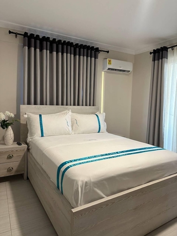Imagen de la habitación del Hotel MANSAH PLUS. Foto 14