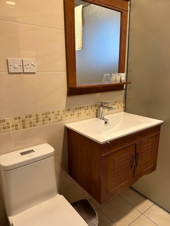 Imagen de la habitación del Hotel MANSAH PLUS. Foto 15