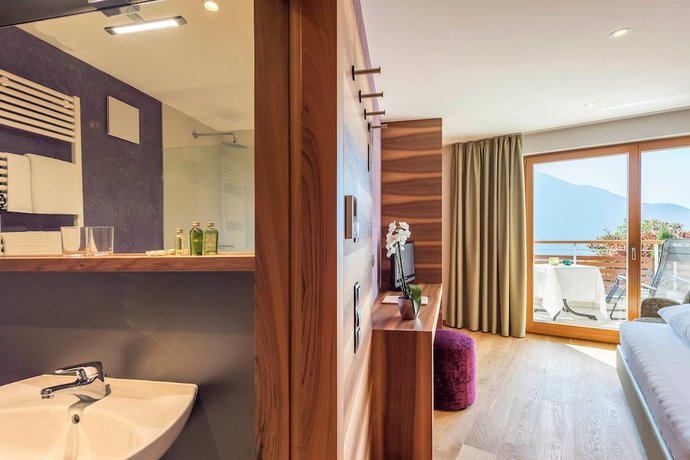 Imagen de la habitación del Hotel MARINIs giardino. Foto 10