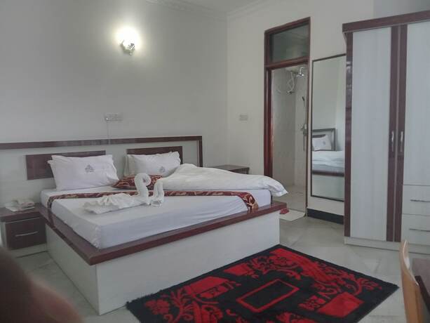 Imagen de la habitación del Hotel MARKDON VILLAGE HOTEL. Foto 7
