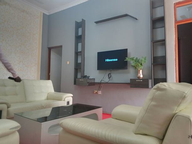 Imagen de la habitación del Hotel MARKDON VILLAGE HOTEL. Foto 9