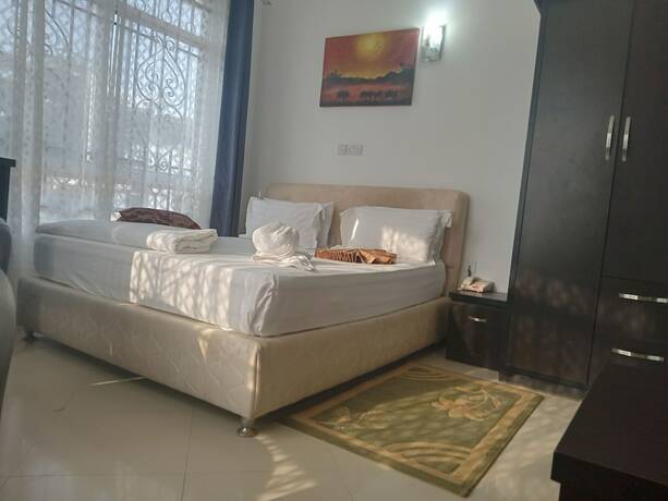 Imagen de la habitación del Hotel MARKDON VILLAGE HOTEL. Foto 11