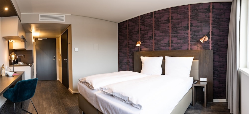 Imagen de la habitación del Hotel MASEVEN München Messe Dornach. Foto 7