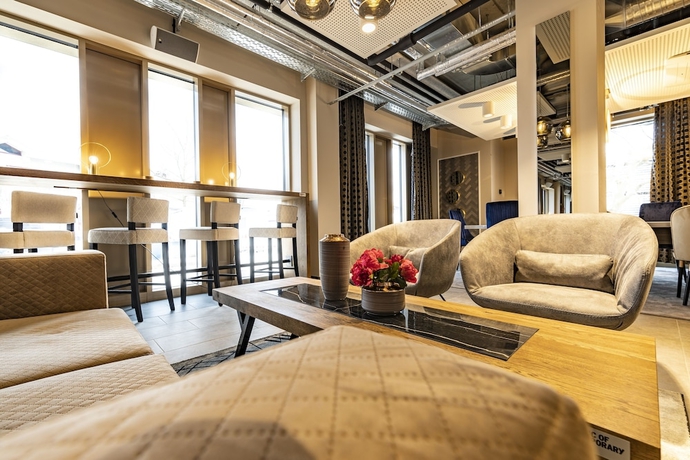 Imagen de los interiores del Hotel MASEVEN München Messe Dornach. Foto 16