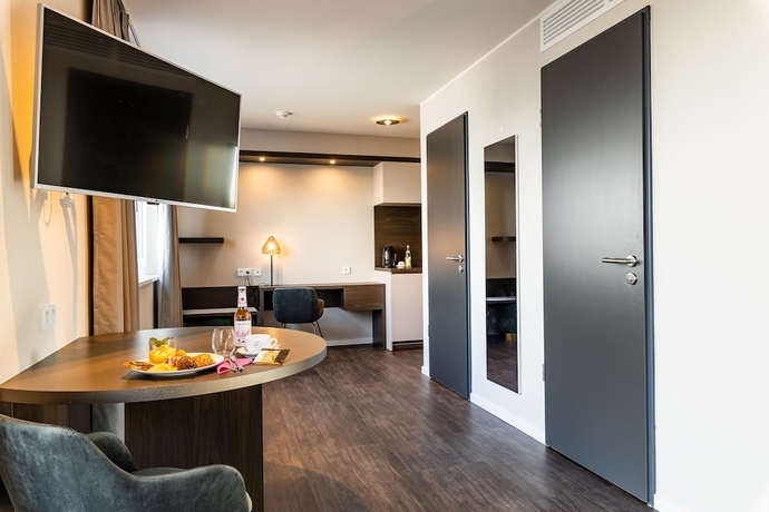 Imagen de la habitación del Hotel MASEVEN München Messe Dornach. Foto 15