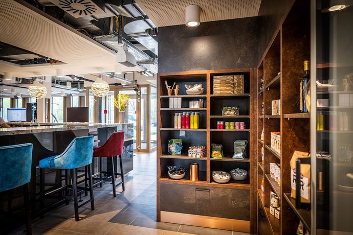 Imagen de los interiores del Hotel MASEVEN München Messe Trudering. Foto 14