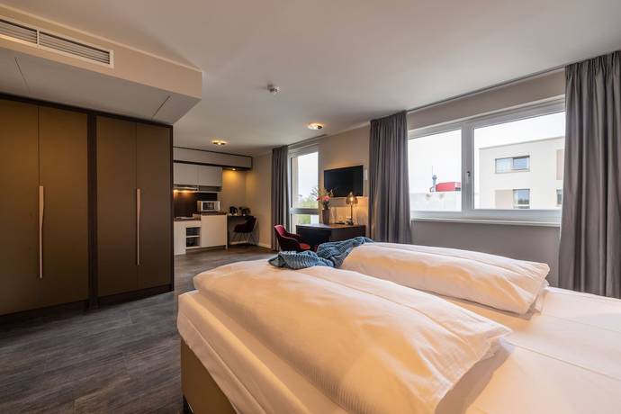 Imagen de la habitación del Hotel MASEVEN München Messe Trudering. Foto 9