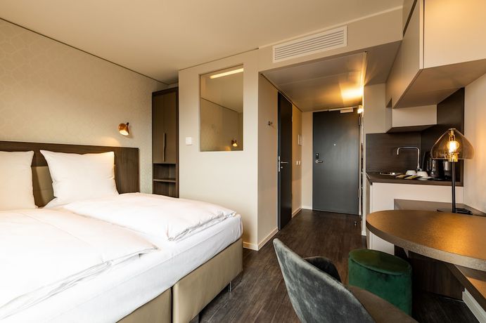 Imagen de la habitación del Hotel MASEVEN München Messe Trudering. Foto 11