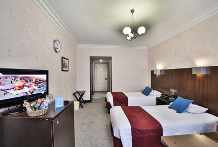 Imagen de la habitación del Hotel MASHAD. Foto 5