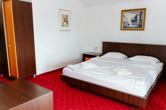 Imagen de la habitación del Hotel MAX International Hotel & Resort. Foto 13