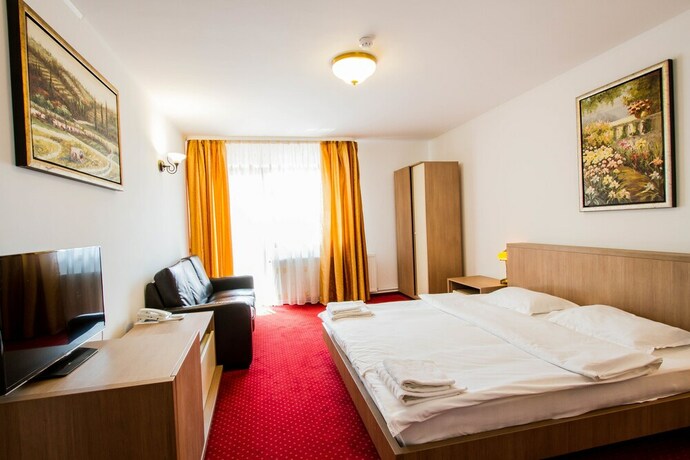 Imagen de la habitación del Hotel MAX International Hotel & Resort. Foto 16