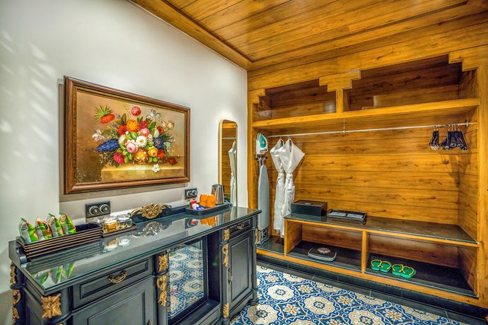 Imagen de la habitación del Hotel MAYFAIR Tea Resort. Foto 13