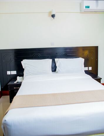 Imagen de la habitación del Hotel MBEYA PARADISE INN. Foto 19