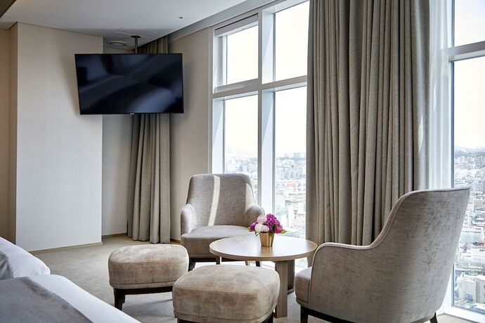 Imagen de la habitación del Hotel MD Doksan. Foto 11