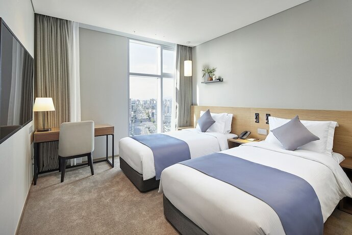 Imagen de la habitación del Hotel MD Doksan. Foto 17