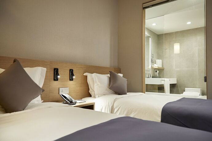 Imagen de la habitación del Hotel MD Doksan. Foto 19