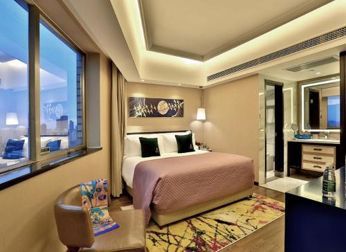 Imagen de la habitación del Hotel MEHOOD LESTIE Hotel (Shanghai Xujiahui Wukang Road). Foto 6
