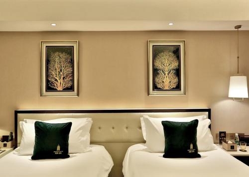 Imagen de la habitación del Hotel MEHOOD LESTIE Hotel (Shanghai Xujiahui Wukang Road). Foto 7